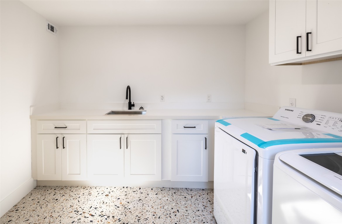 1206 Cloverleaf Drive Austin, TX 78723 - Photo 8 of 22 a bathroom with a sink and a mirror