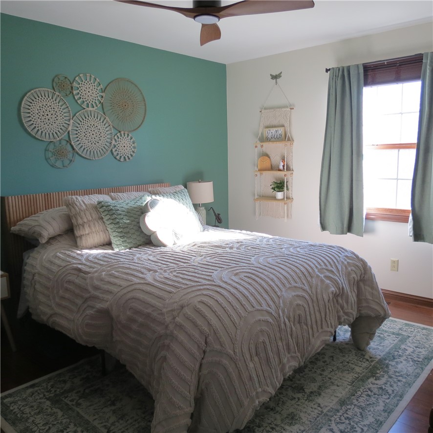10160 Lochard Road Sidney, OH 45365 - Photo 24 of 41 This cozy bedroom offers a tranquil retreat with ample natural light.