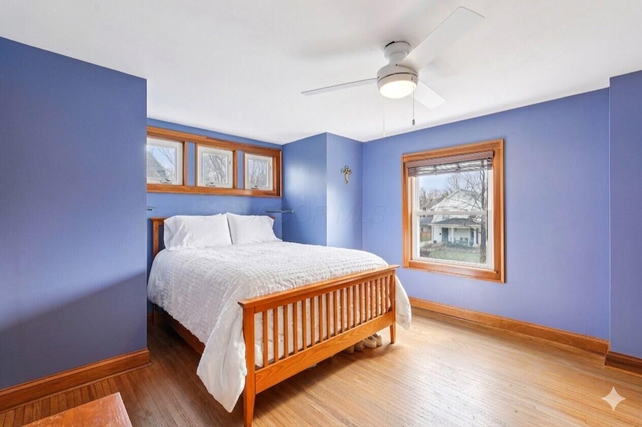 116 East Dunedin Road Columbus, OH 43214 - Photo 10 of 22 Bedroom with white bedding