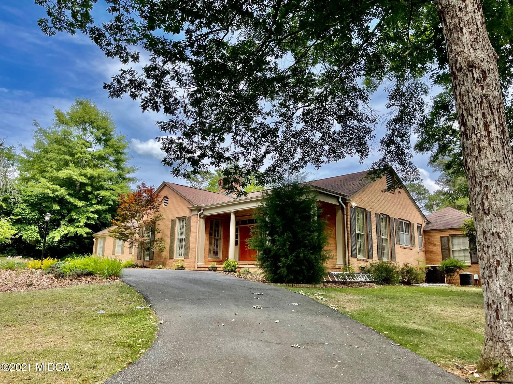 1845 Lincoln Road Macon, GA 31211 - Photo 1 of 31 front view of a house with a tree