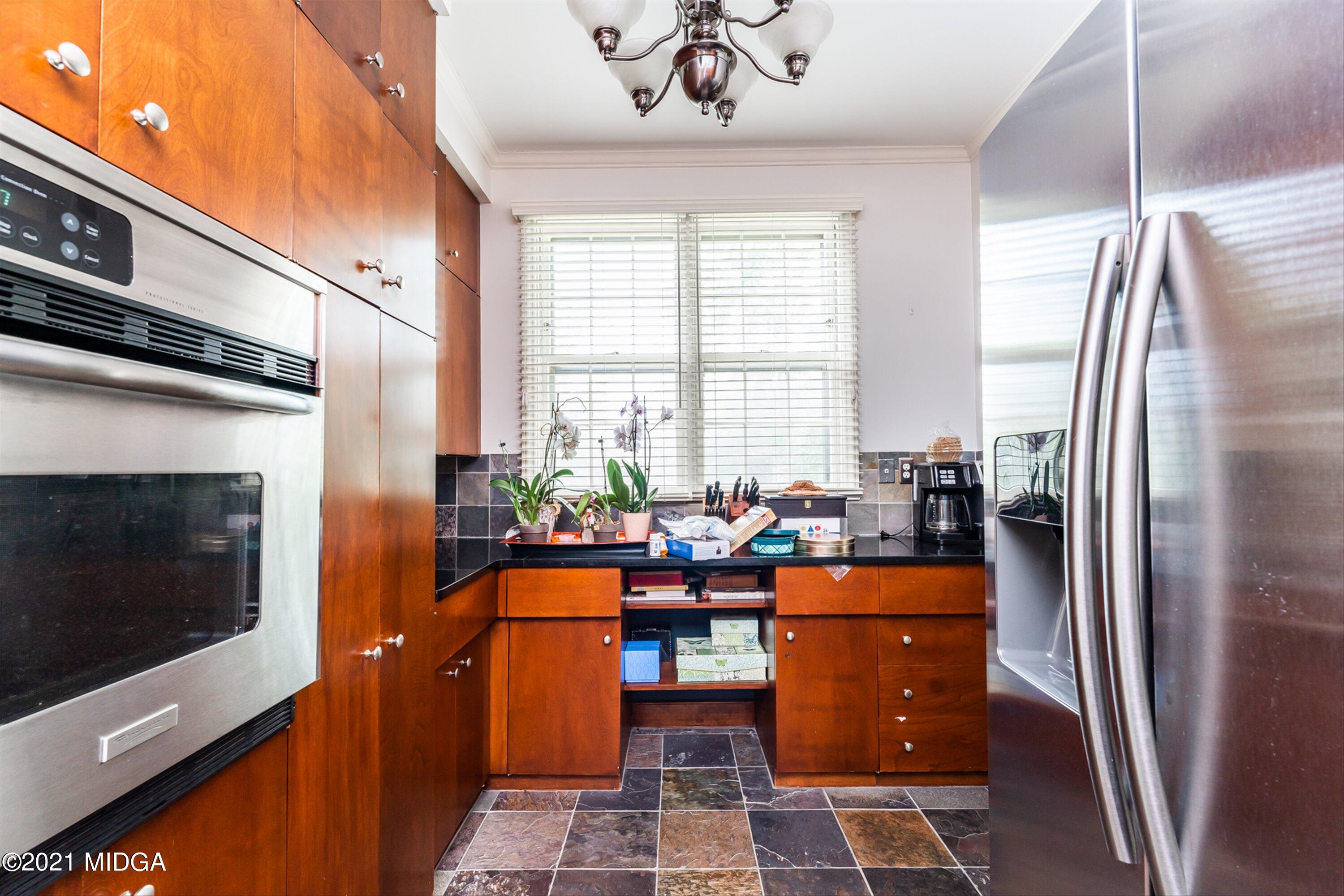 1845 Lincoln Road Macon, GA 31211 - Photo 13 of 31 a dining room with furniture and a fireplace