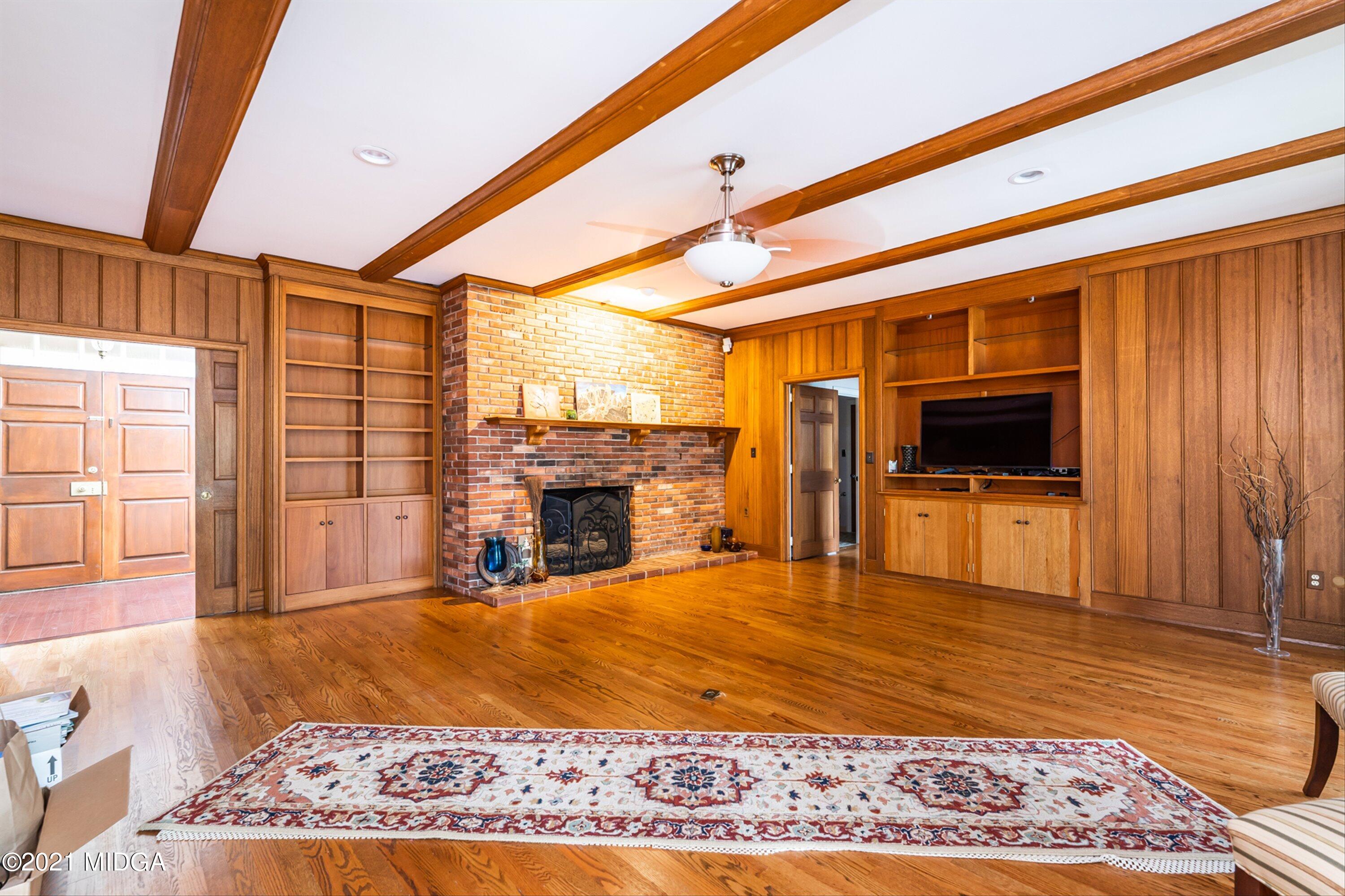 1845 Lincoln Road Macon, GA 31211 - Photo 15 of 31 a view of an empty room with a fireplace and a window