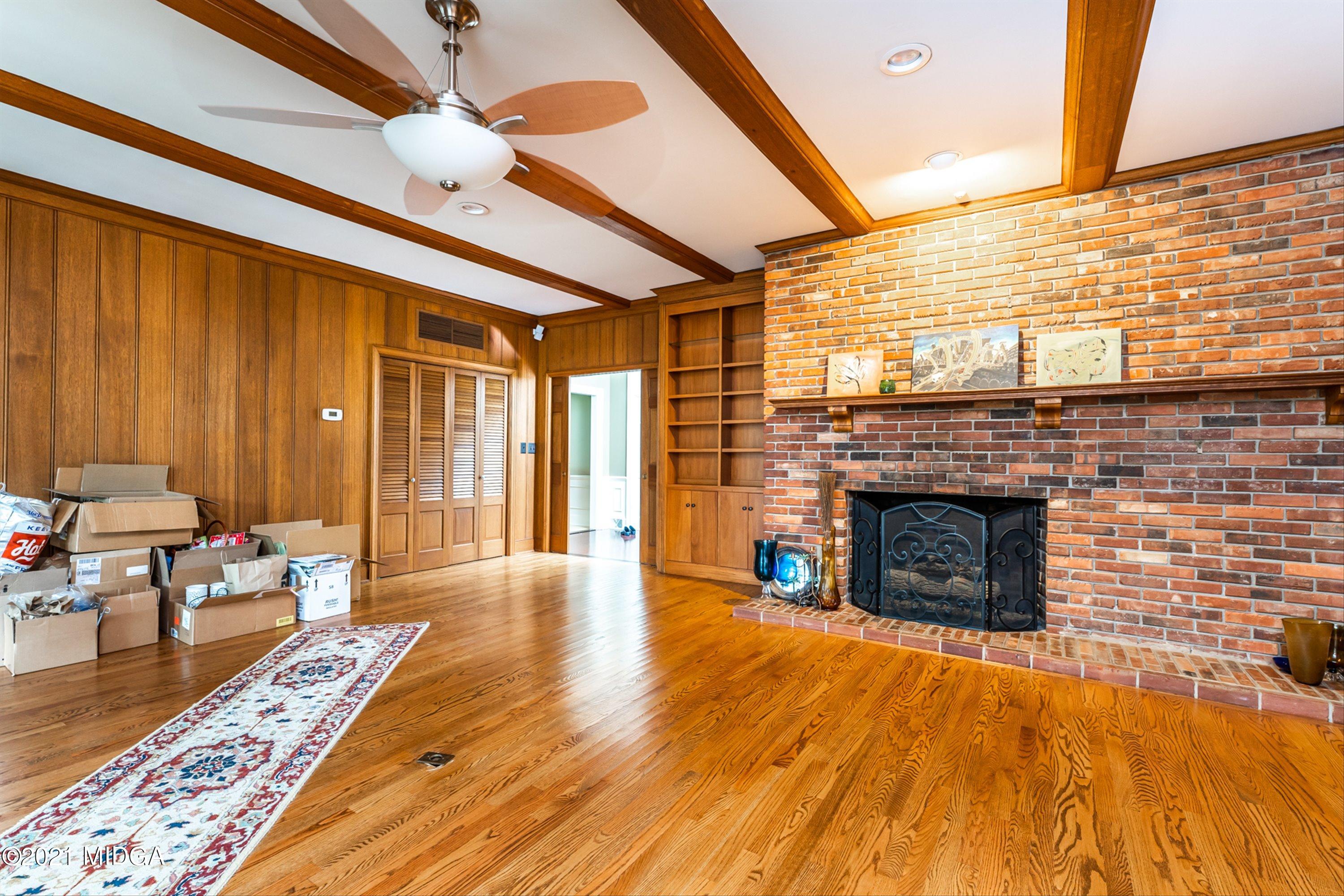 1845 Lincoln Road Macon, GA 31211 - Photo 17 of 31 a living room with furniture and a fireplace