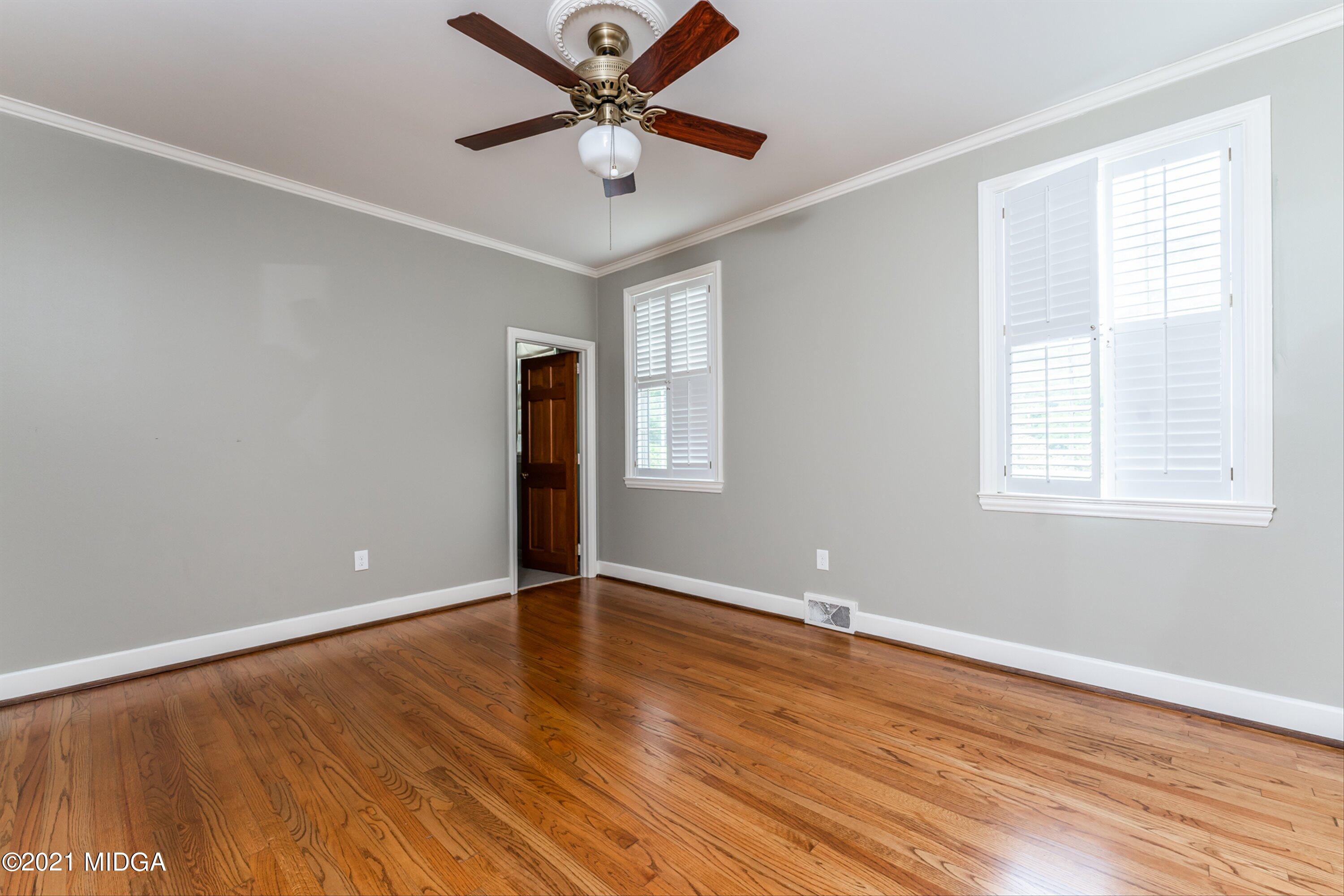 1845 Lincoln Road Macon, GA 31211 - Photo 18 of 31 wooden floor in an empty room with a window