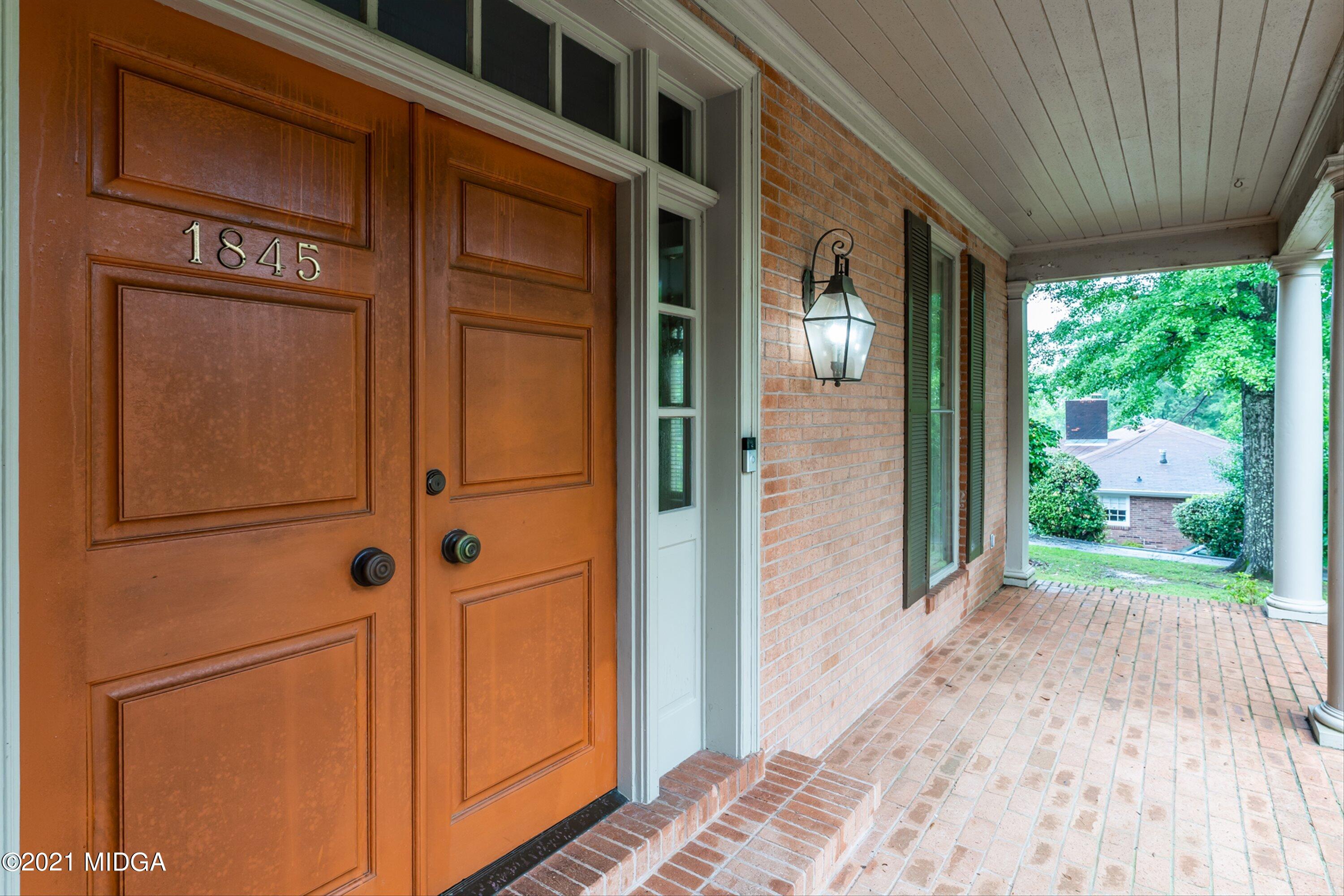 1845 Lincoln Road Macon, GA 31211 - Photo 5 of 31 a view of a house with a door and wooden floor