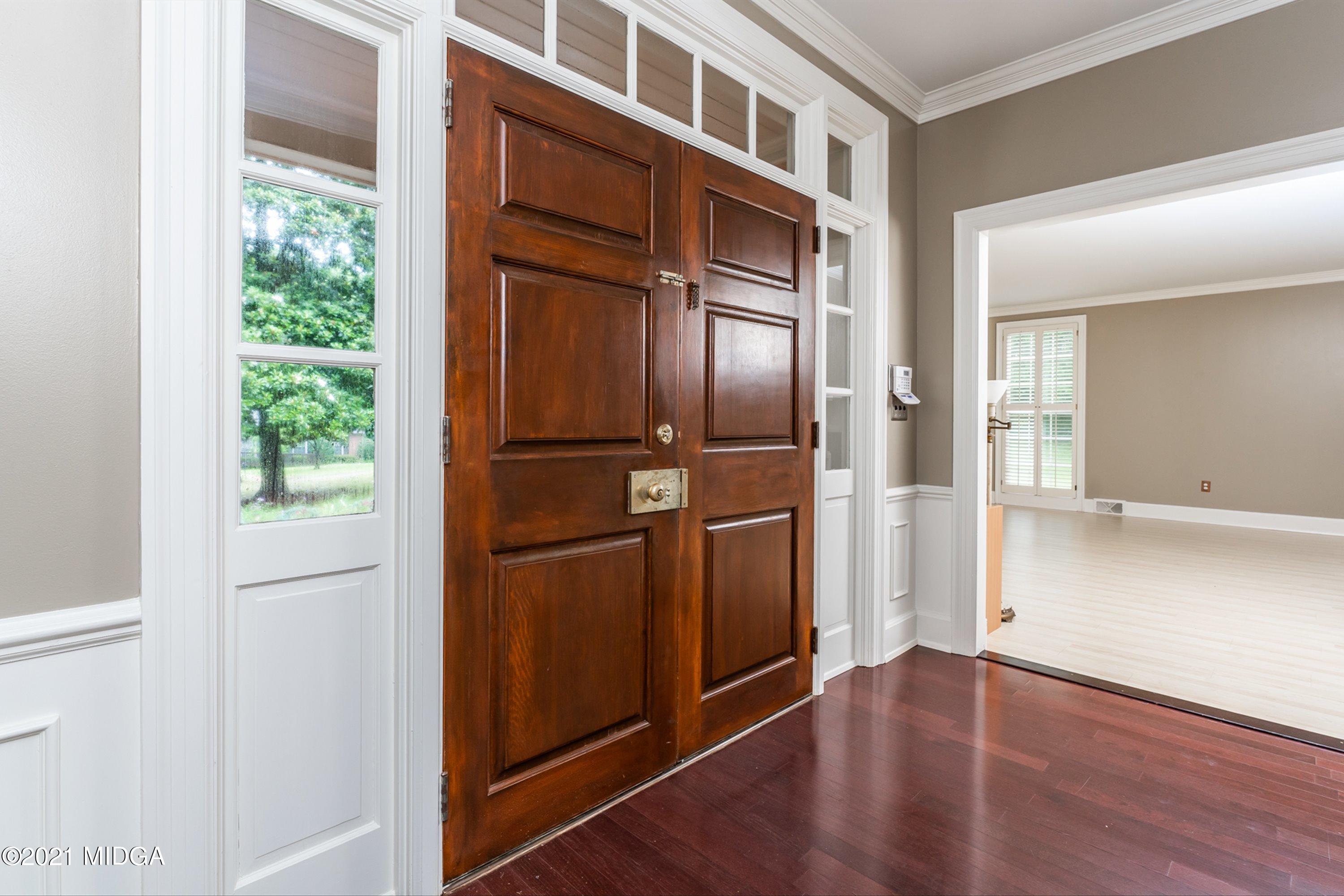 1845 Lincoln Road Macon, GA 31211 - Photo 6 of 31 an empty room with wooden floor closet and windows