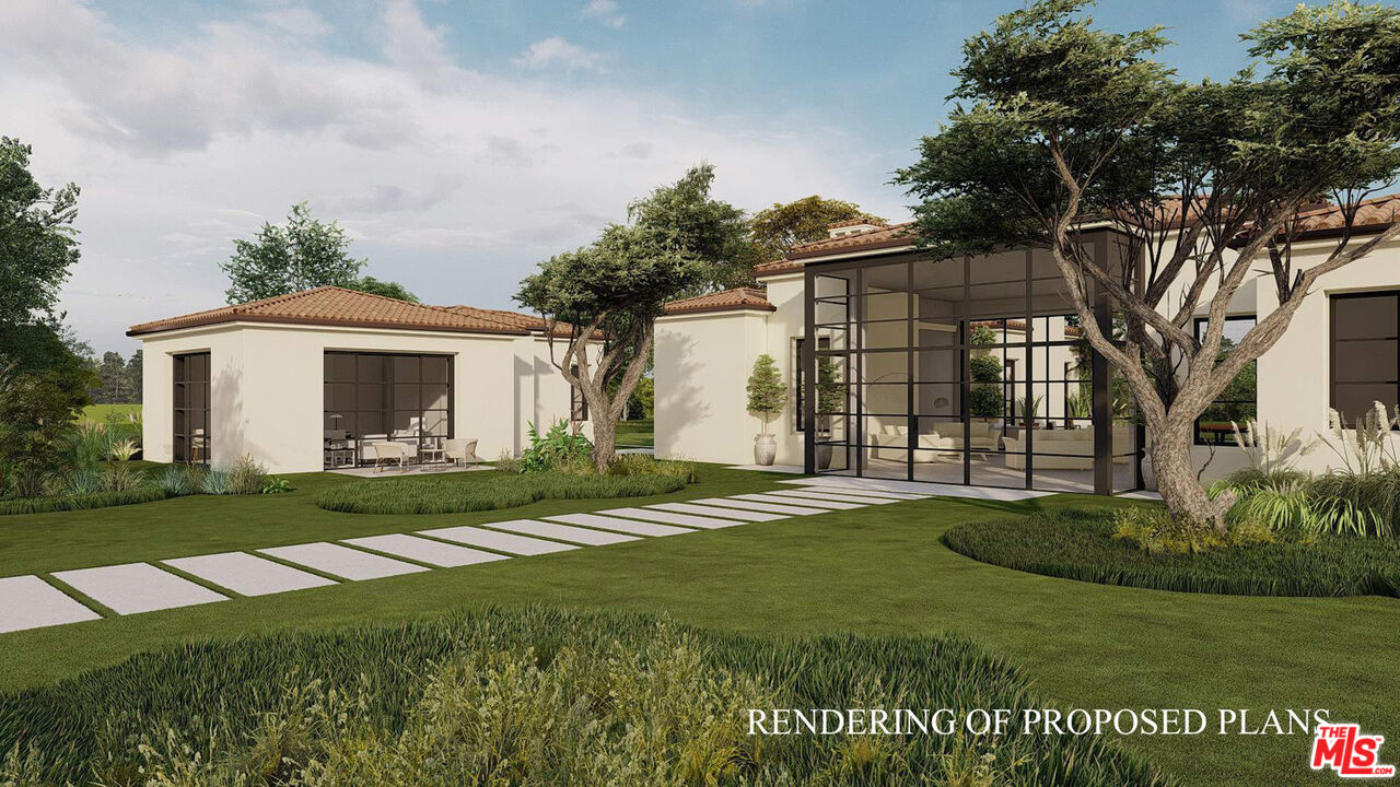 415 Meadowbrook Drive Montecito, CA 93108 - Photo 4 of 14 a front view of a house with a garden and yard