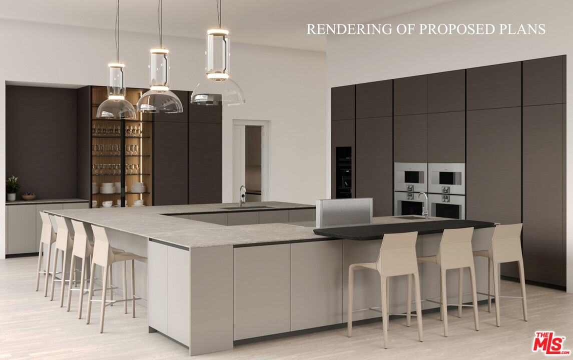 415 Meadowbrook Drive Montecito, CA 93108 - Photo 5 of 14 a kitchen with a dining table chairs and white cabinets