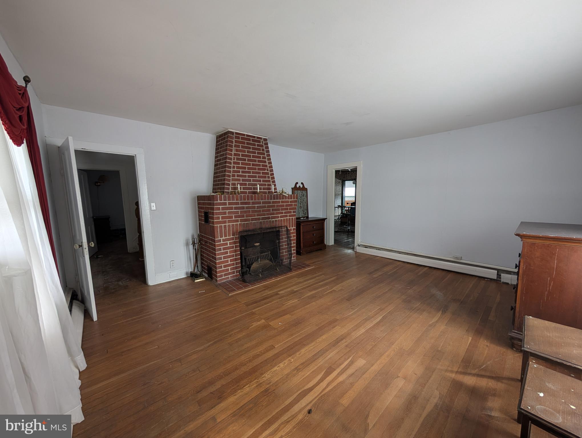 210 Chestnut Tree Road Hebron, MD 21830 - Photo 11 of 29 Current living room - Check out that fireplace!