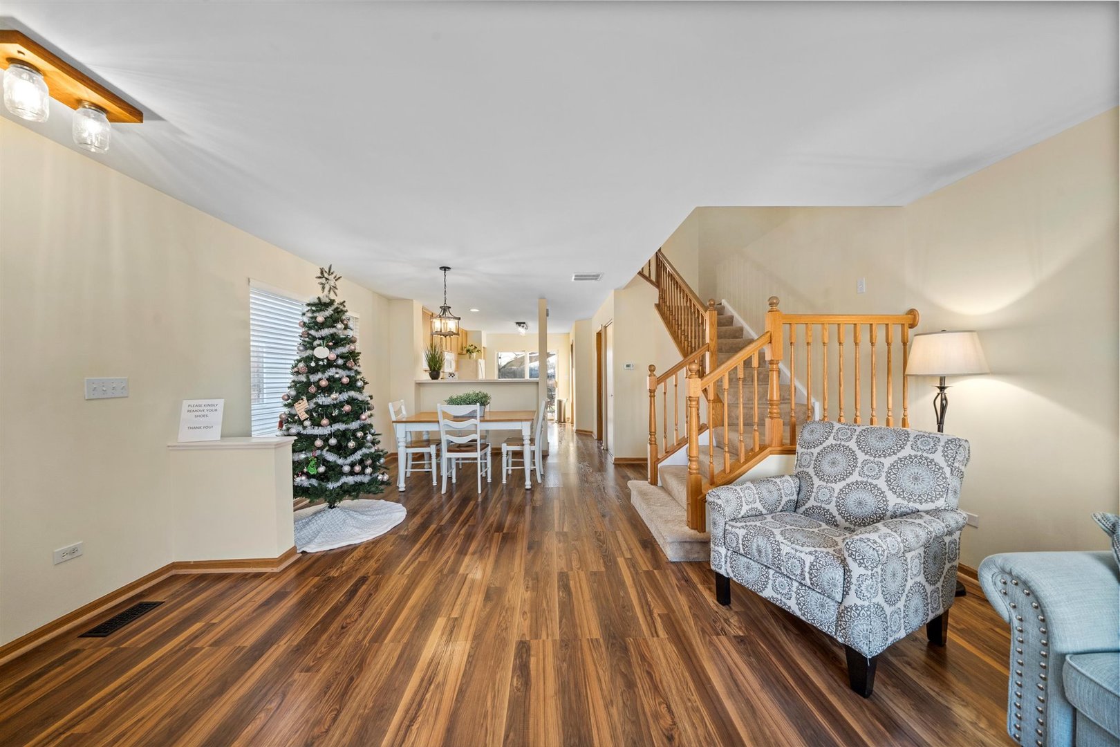 2431 Roxbury Lane Montgomery, IL 60538 - Photo 3 of 13 a living room with furniture and wooden floor