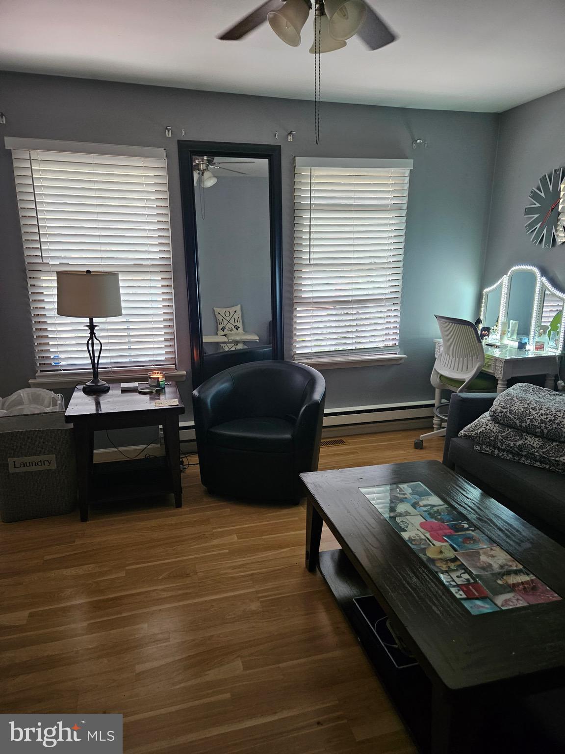 11 Dover Court Clementon, NJ 08021 - Photo 14 of 20 a living room with furniture flat screen tv and window