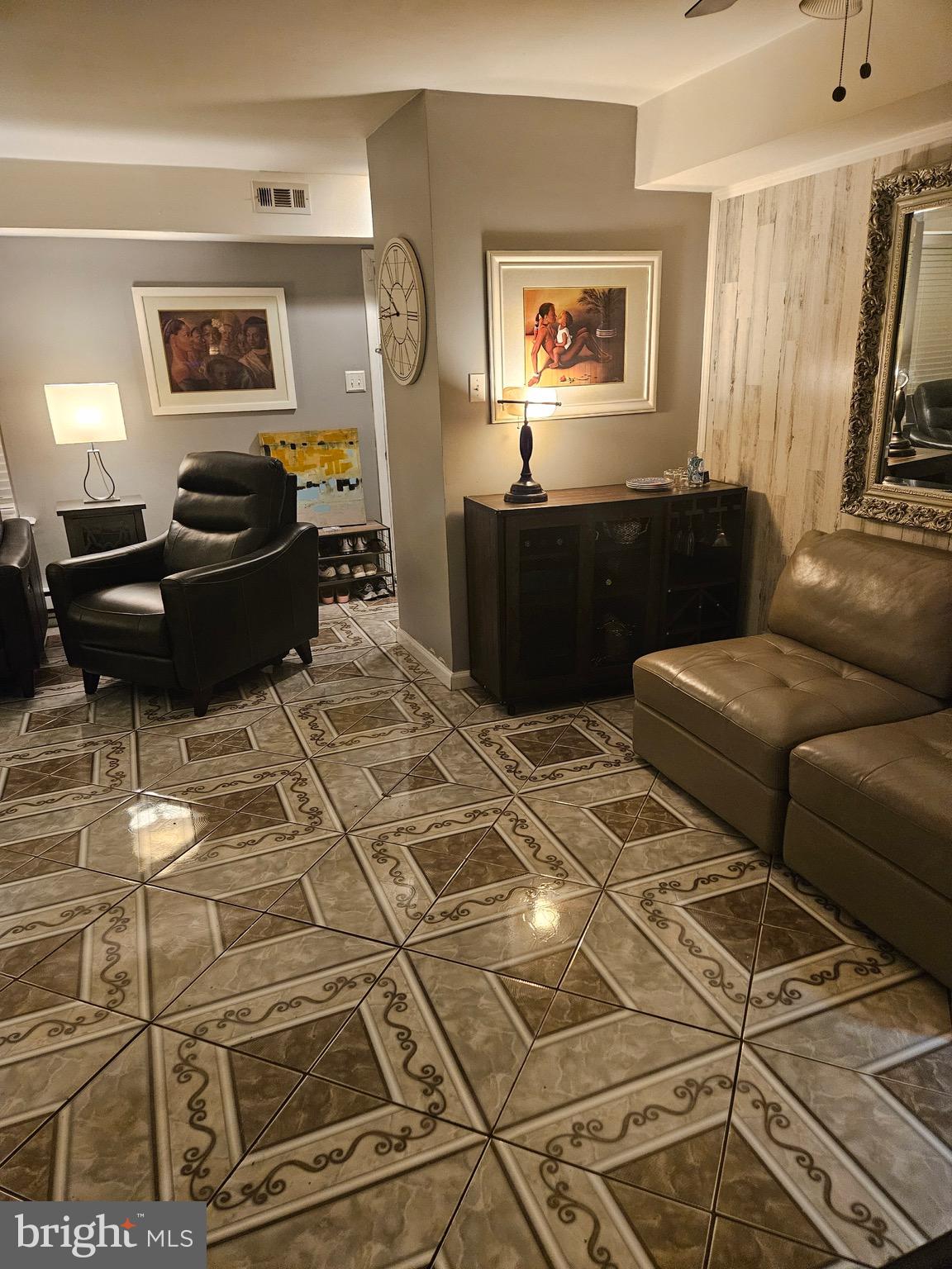 11 Dover Court Clementon, NJ 08021 - Photo 5 of 20 a living room with a couch and a stove with wooden floor