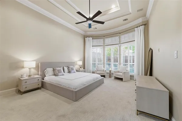 a spacious bathroom with a double vanity sink a large mirror and shower