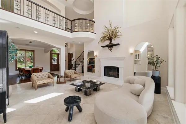a view of a dining room and livingroom with furniture