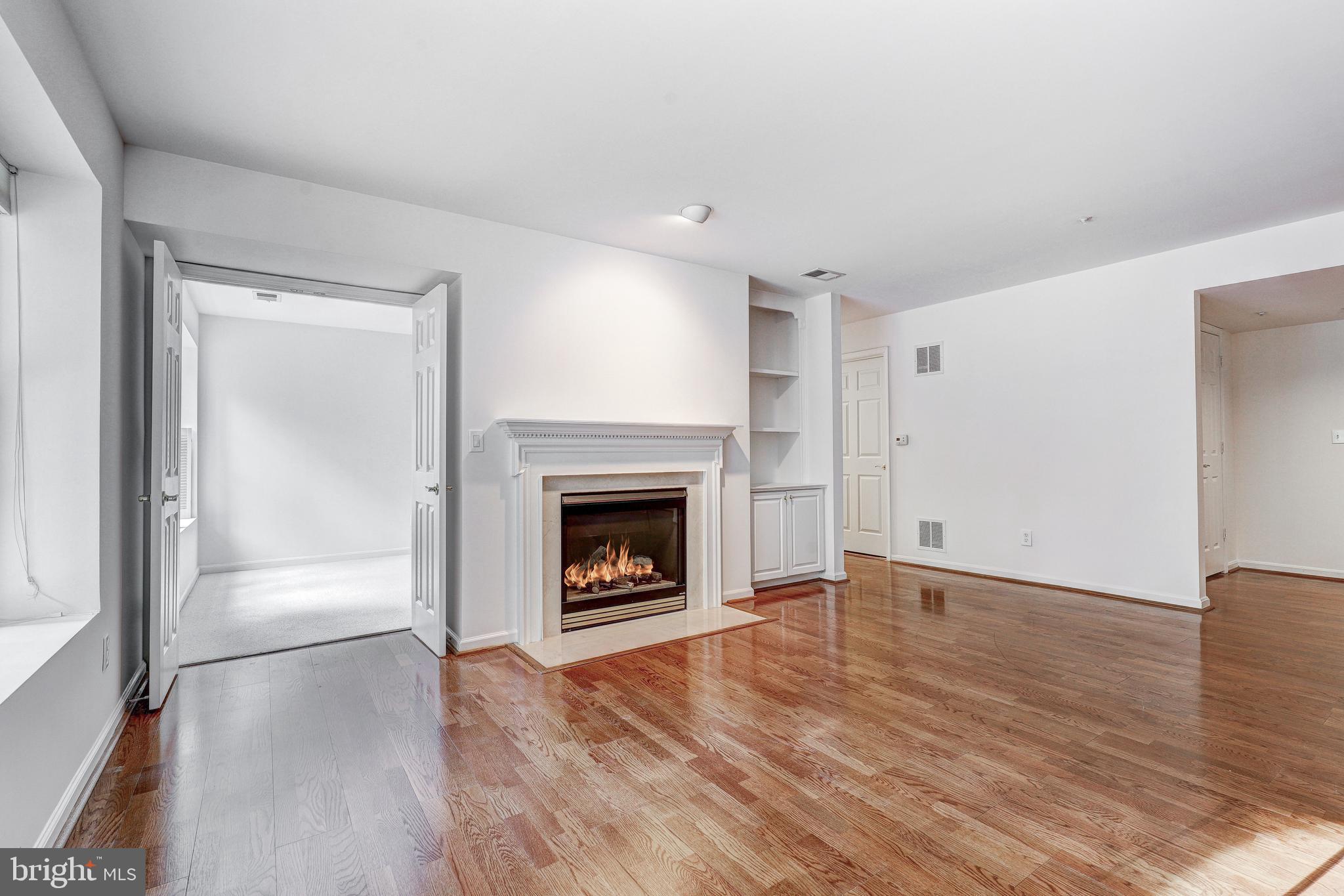 12310 Rosslare Ridge Road, Unit 202 Lutherville-Timonium, MD 21093 - Photo 10 of 32 Living Room to Den