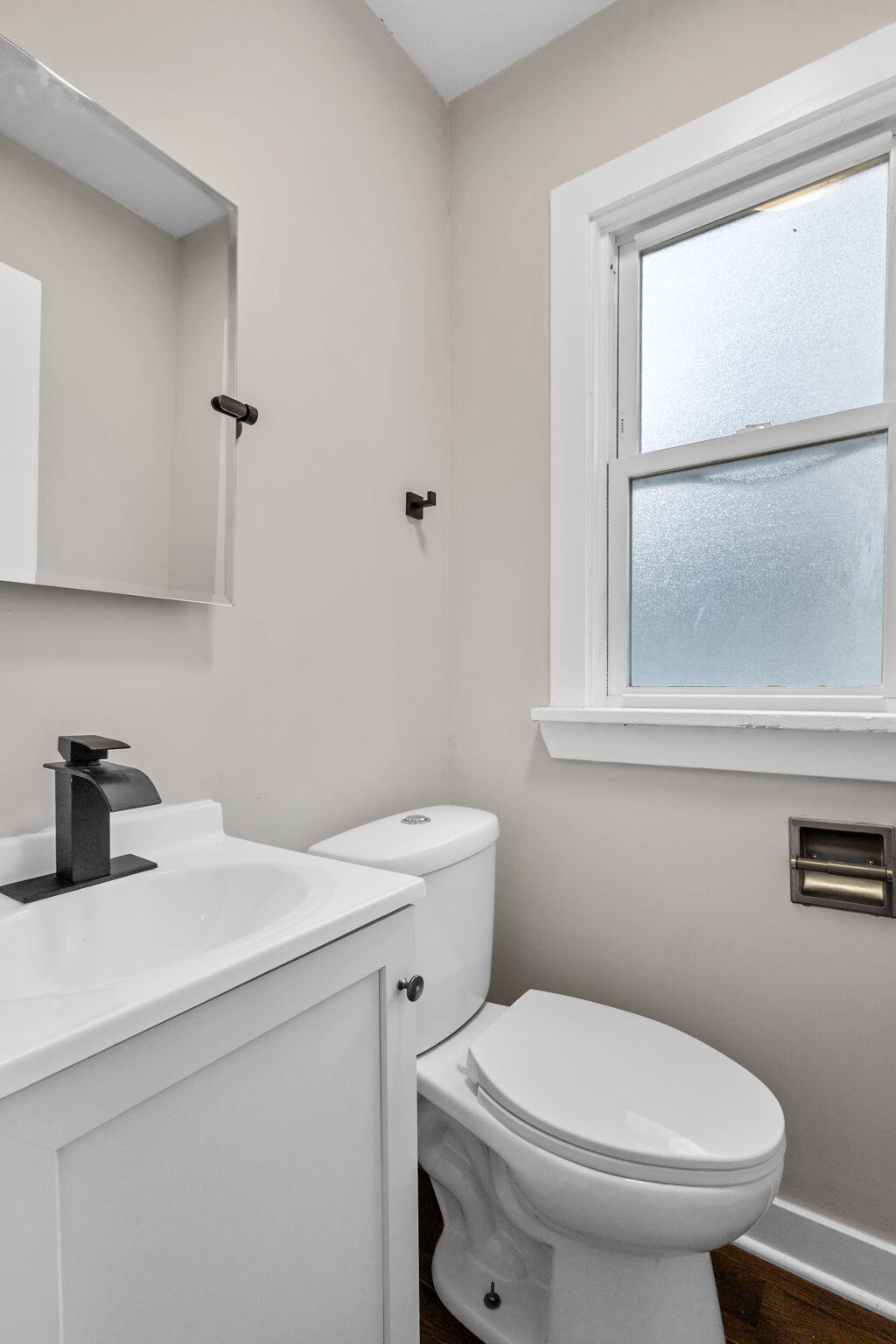 4680 Harrison Street Gary, IN 46408 - Photo 11 of 26 a bathroom with a sink a toilet and a window