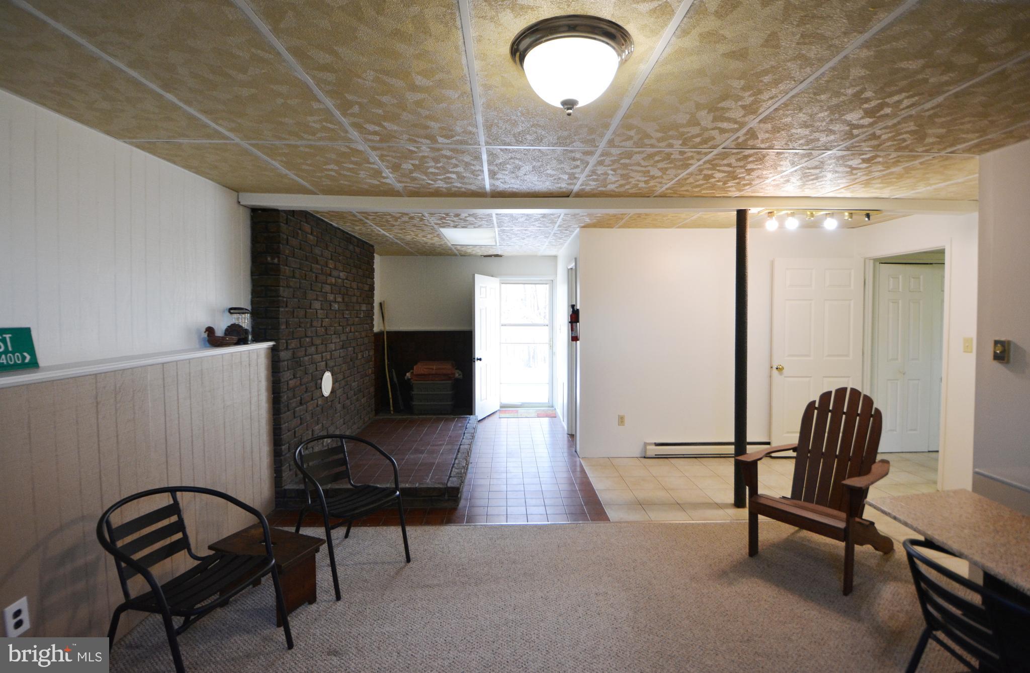 15522 Liberty Road Mount Airy, MD 21771 - Photo 30 of 53 Lower exit door to hardscape patio from family rm