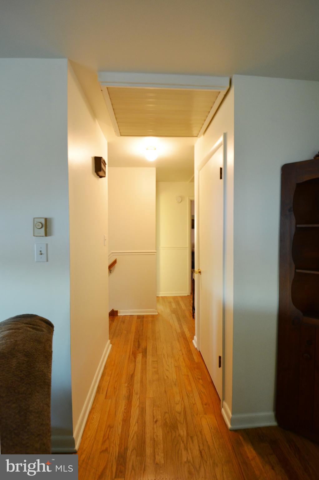 15522 Liberty Road Mount Airy, MD 21771 - Photo 37 of 53 Ceiling whole house fan in main hallway