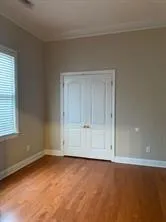 an empty room with a empty space and window