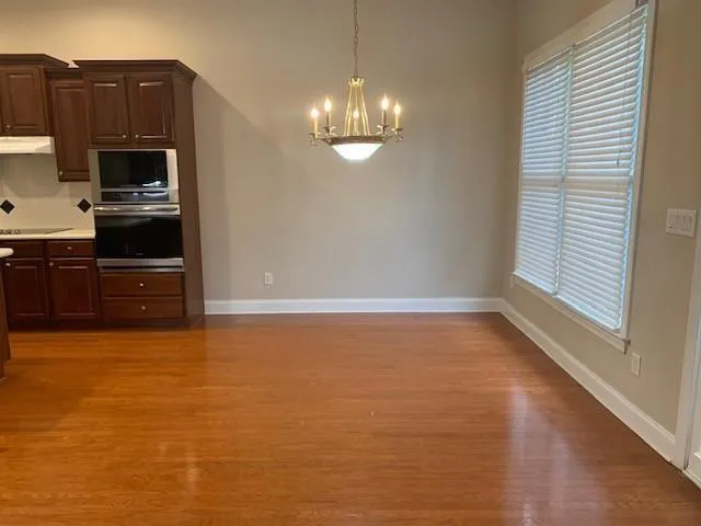 a view of kitchen and microwave