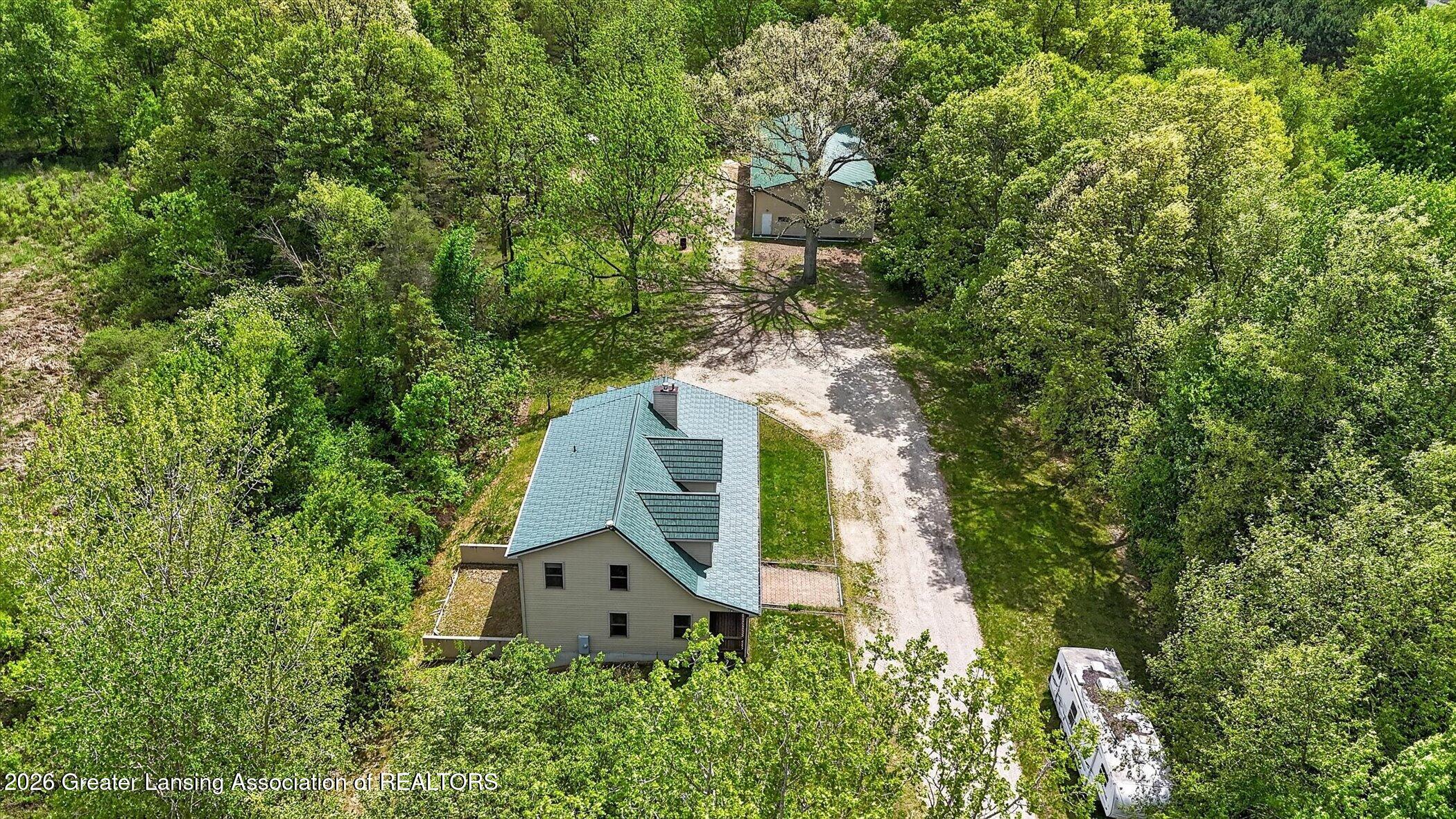 1300 East Round Lake Road Dewitt, MI 48820 - Photo 49 of 59 48-1300-E-Round-Lake-Rd-WindowStill-Phot