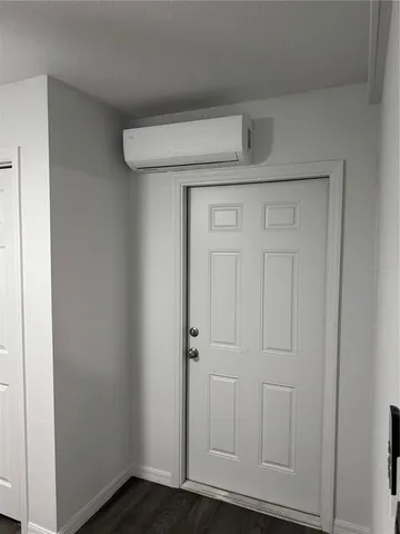 a kitchen with stainless steel appliances a refrigerator and a stove top oven