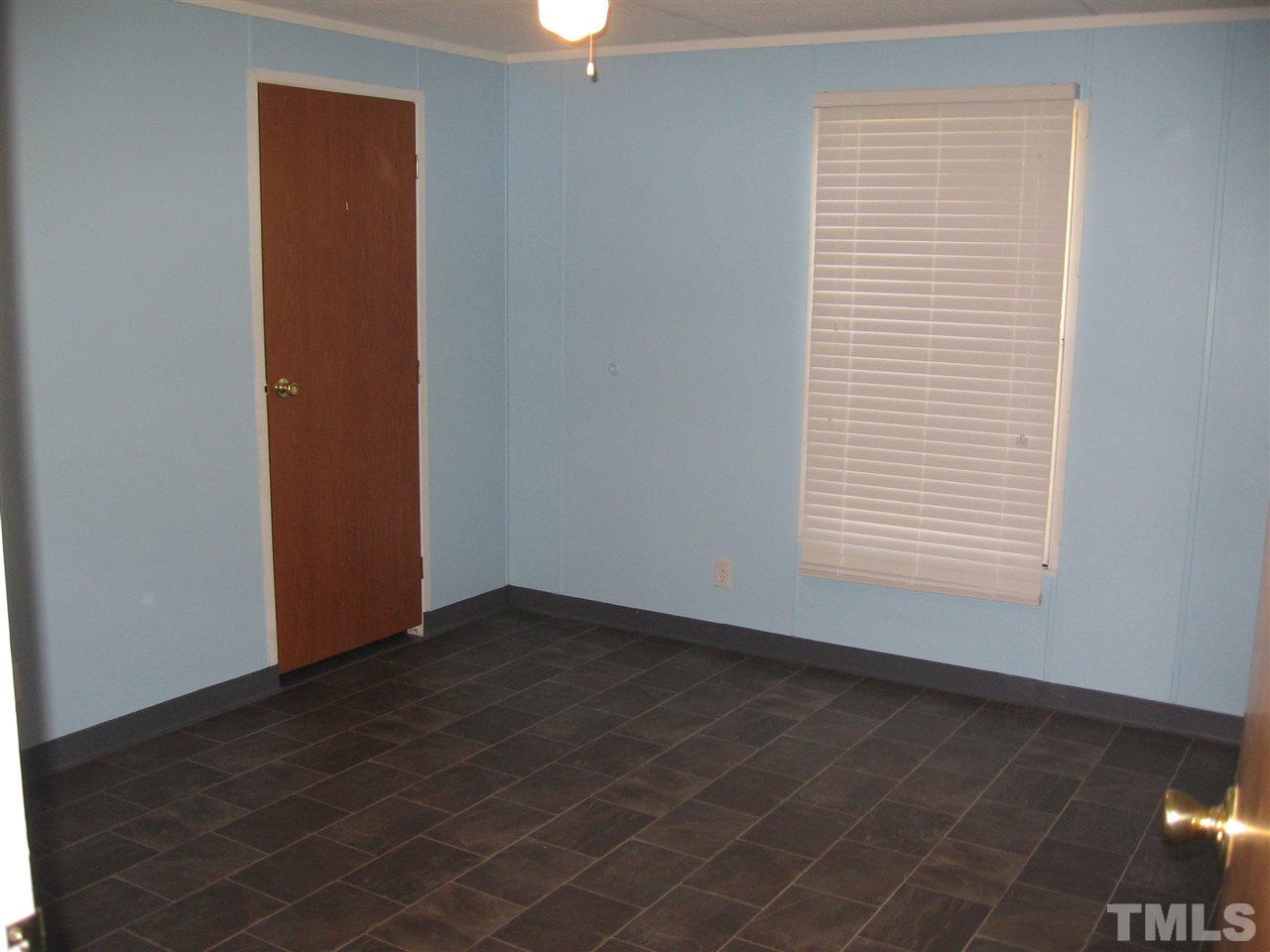 155 Charlie Fields Road Pittsboro, NC 27312 - Photo 19 of 25 3rd bedroom is large & also has a walk-in closet.