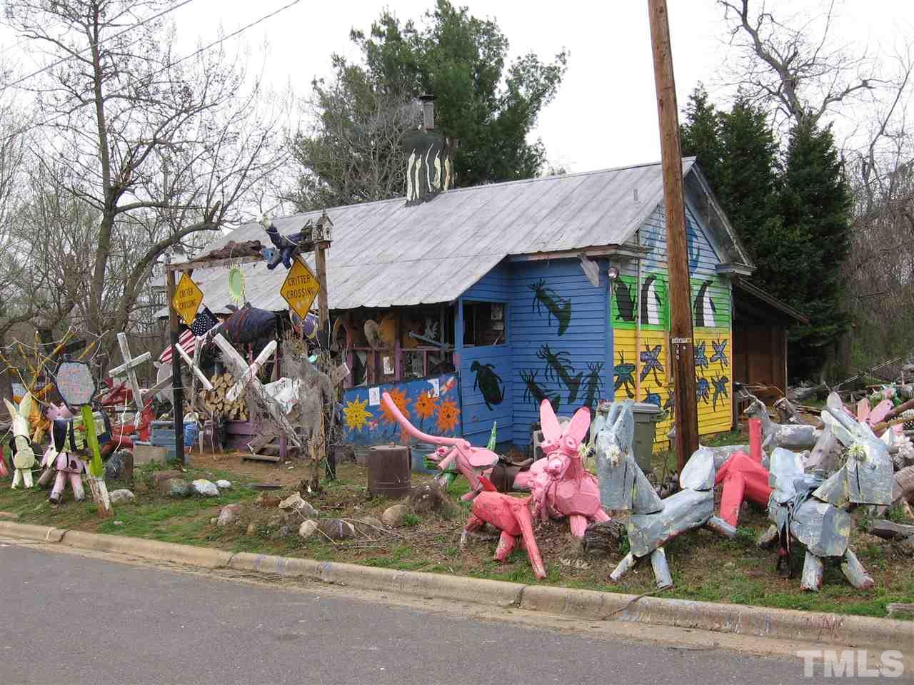 155 Charlie Fields Road Pittsboro, NC 27312 - Photo 21 of 25 Bynum Village is home to MANY artists including local favorite (& world renown) chainsaw sculpture, Clyde Jones. An annual "Clydefest" festival is held at the ball-field. His "critters" are all over Bynum & most are lit up 24-7-365.