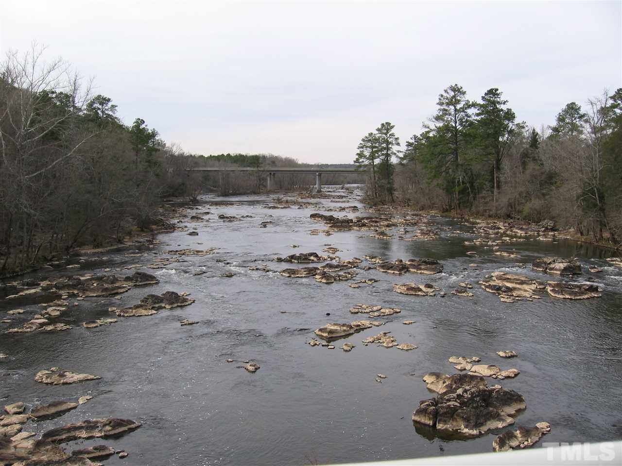 155 Charlie Fields Road Pittsboro, NC 27312 - Photo 23 of 25 Haw River to right of the old bridge. Fishing, wading, swimming. Very short walk to bridge & river from 155 Charlie Fields.