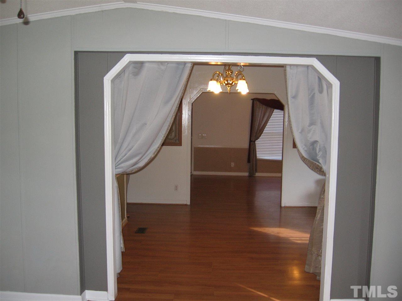 155 Charlie Fields Road Pittsboro, NC 27312 - Photo 8 of 25 Thru-way from bonus to dining to living.