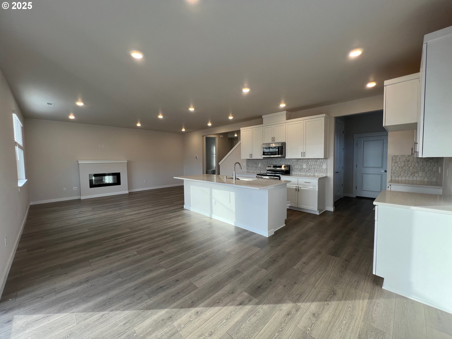 1001 Southwest 30th Street Battle Ground, WA 98604 - Photo 13 of 29 a view of kitchen with kitchen island microwave oven stove and oven