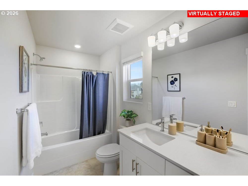 1001 Southwest 30th Street Battle Ground, WA 98604 - Photo 16 of 29 a bathroom with a sink a toilet and shower