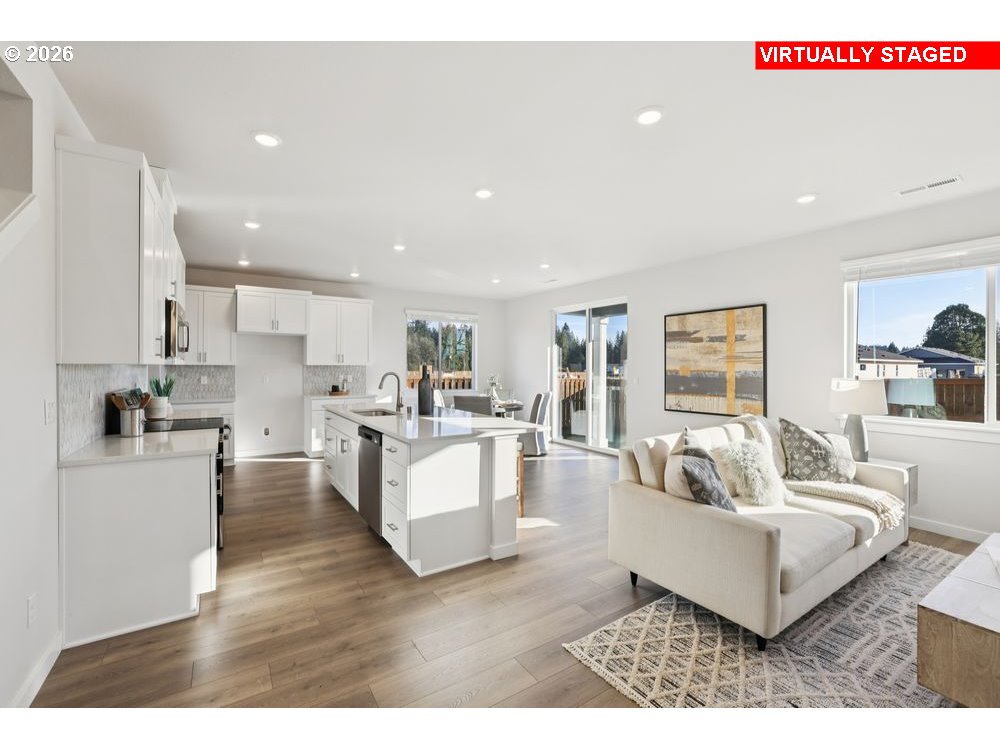 1001 Southwest 30th Street Battle Ground, WA 98604 - Photo 29 of 29 a living room with furniture and kitchen view