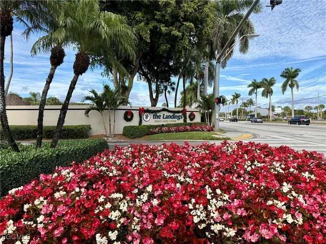 a sign that is sitting in front of a house