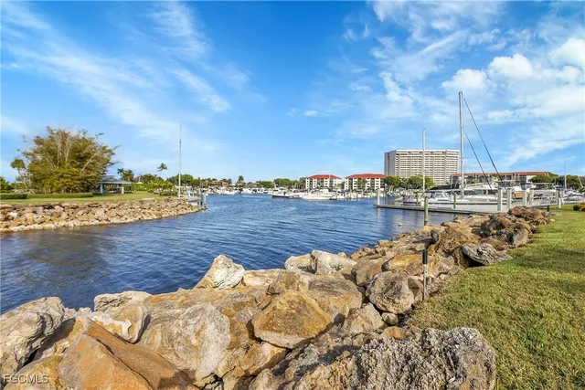 a view of a lake with a city