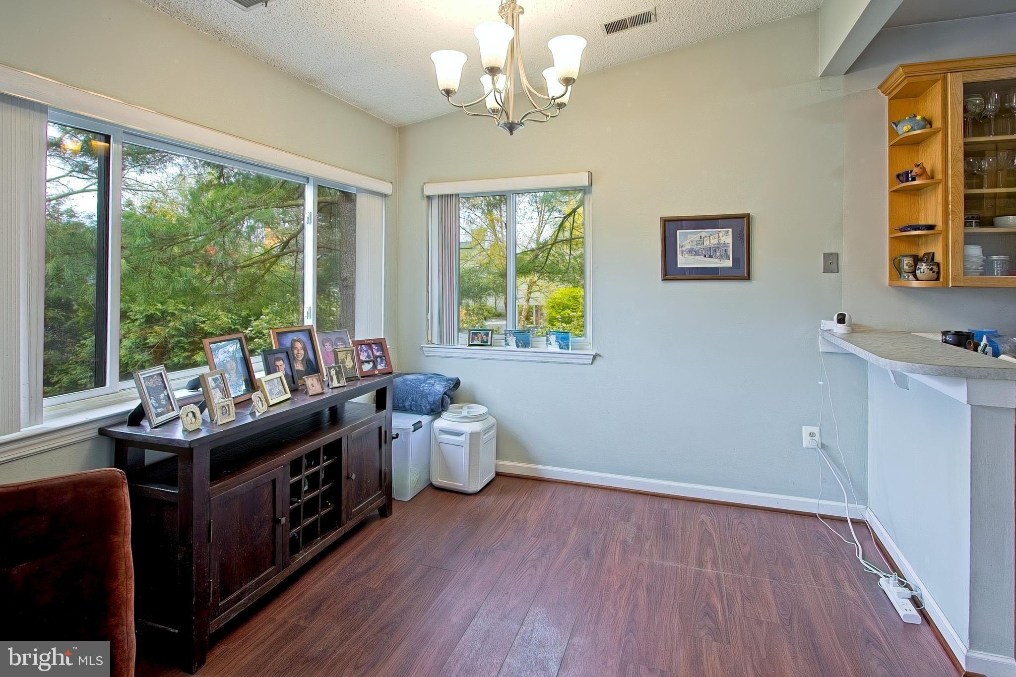 11045 Villaridge Court Reston, VA 20191 - Photo 12 of 38 Adjoining dining room with large windows