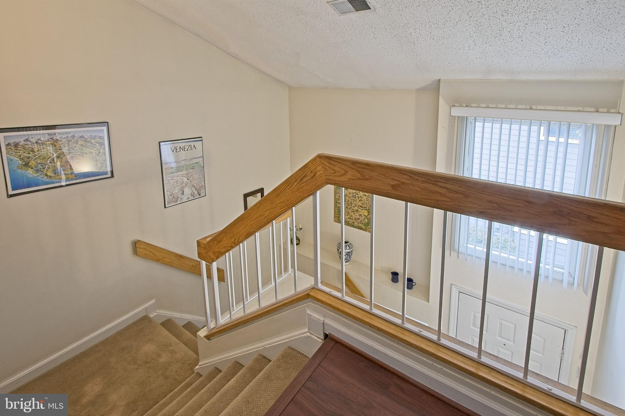 11045 Villaridge Court Reston, VA 20191 - Photo 6 of 38 Private staircase to the living and dining areas