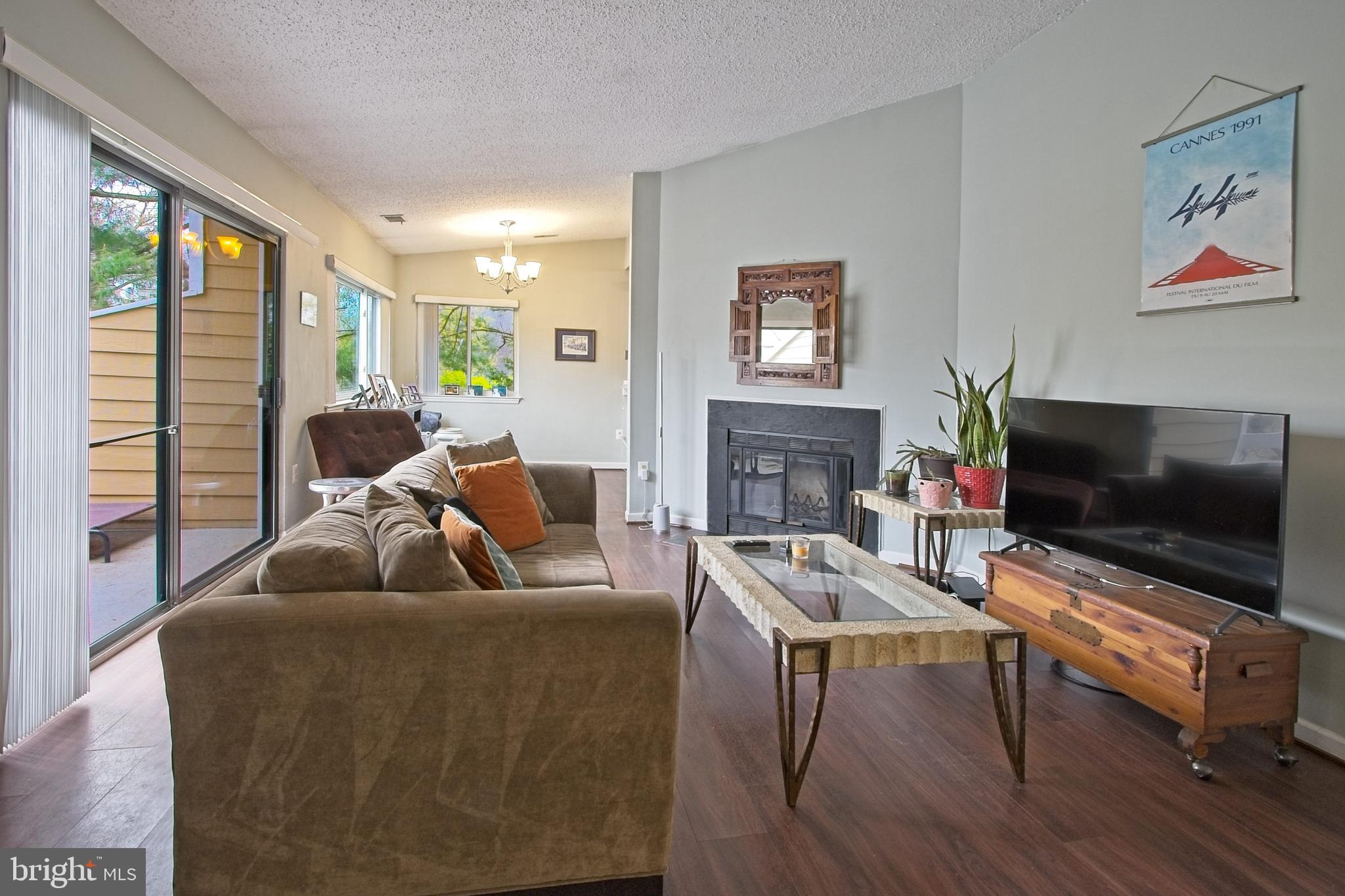 11045 Villaridge Court Reston, VA 20191 - Photo 8 of 38 LVT flooring in living and dining areas