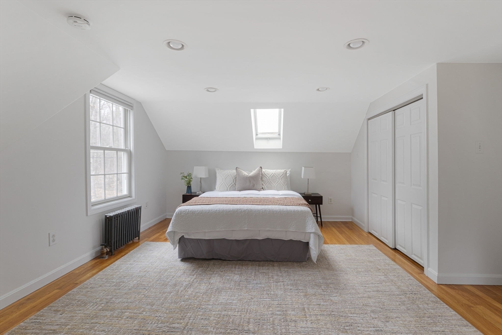 42 Swain Road Wilmington, MA 01887 - Photo 11 of 28 a bedroom with a bed and a window