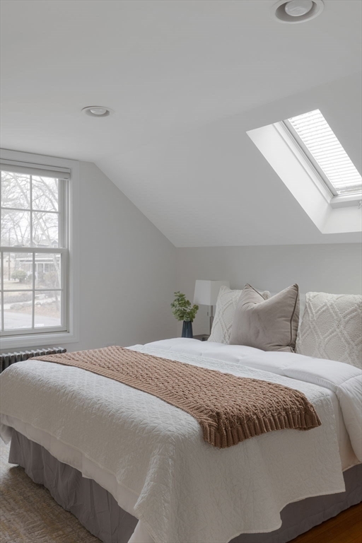 42 Swain Road Wilmington, MA 01887 - Photo 12 of 28 a bedroom with a bed and a window