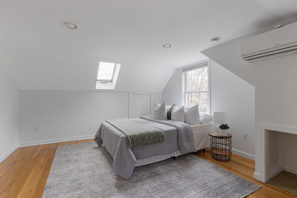 42 Swain Road Wilmington, MA 01887 - Photo 14 of 28 a bedroom with a bed and a window
