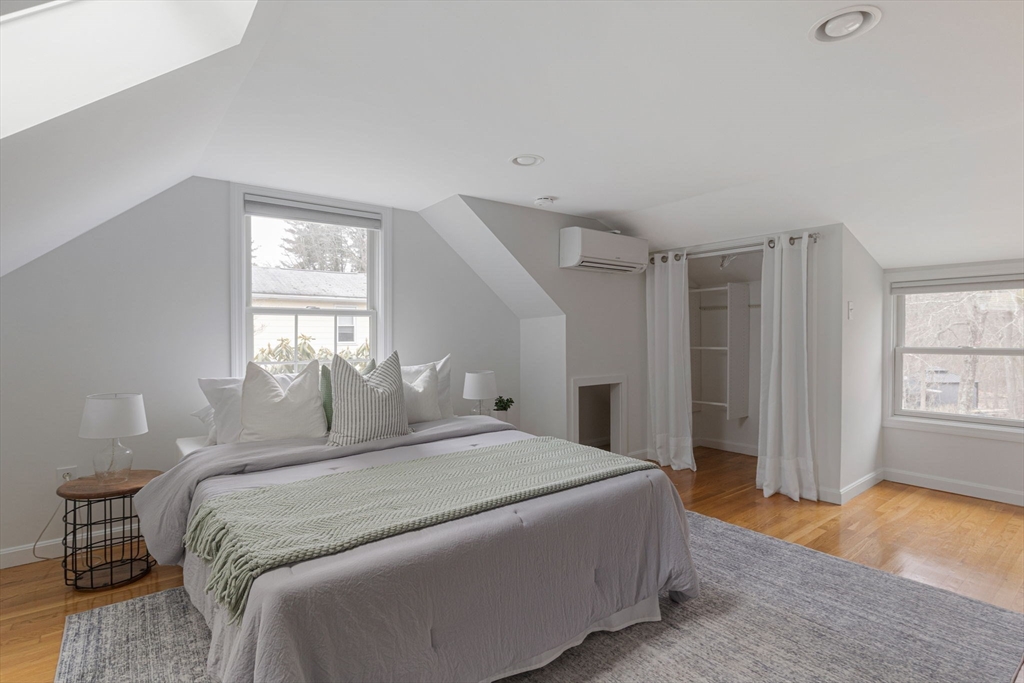 42 Swain Road Wilmington, MA 01887 - Photo 15 of 28 a bedroom with a bed and a window