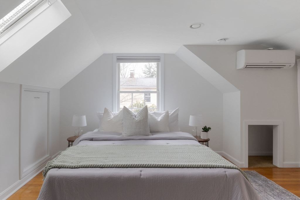 42 Swain Road Wilmington, MA 01887 - Photo 16 of 28 a bedroom with a bed and window