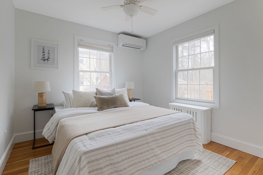 42 Swain Road Wilmington, MA 01887 - Photo 17 of 28 a bedroom with a bed and a window