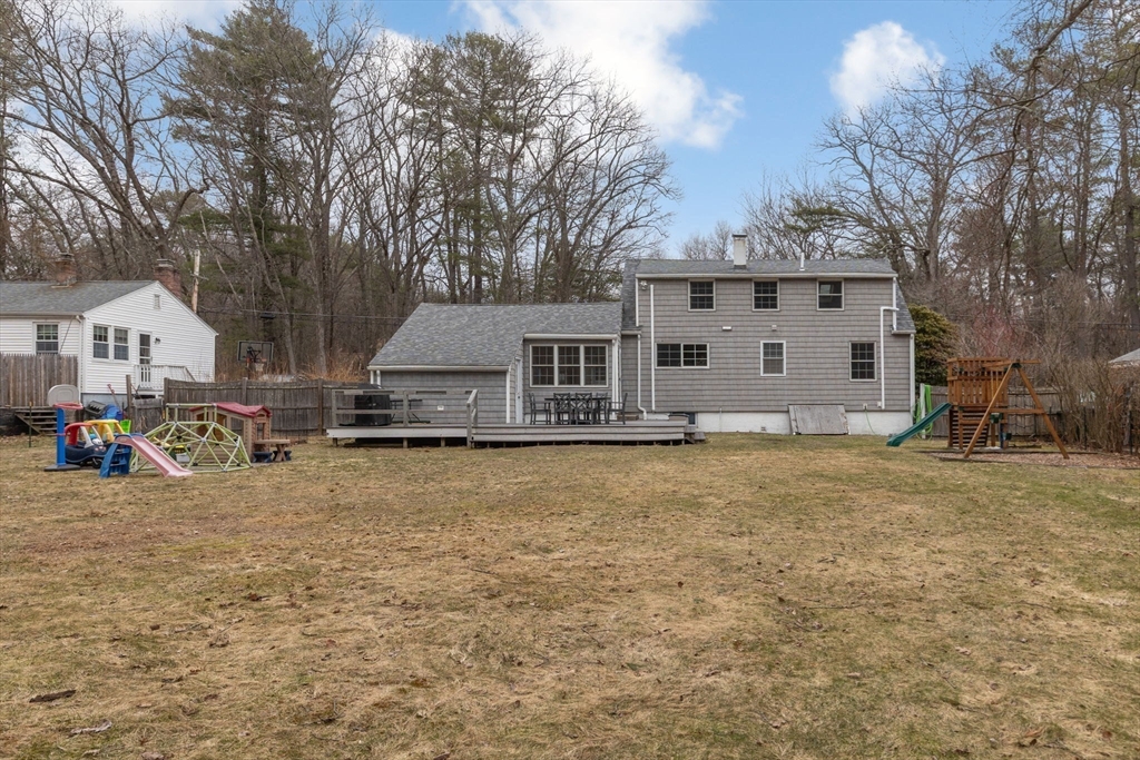 42 Swain Road Wilmington, MA 01887 - Photo 21 of 28 a house with trees in front of it