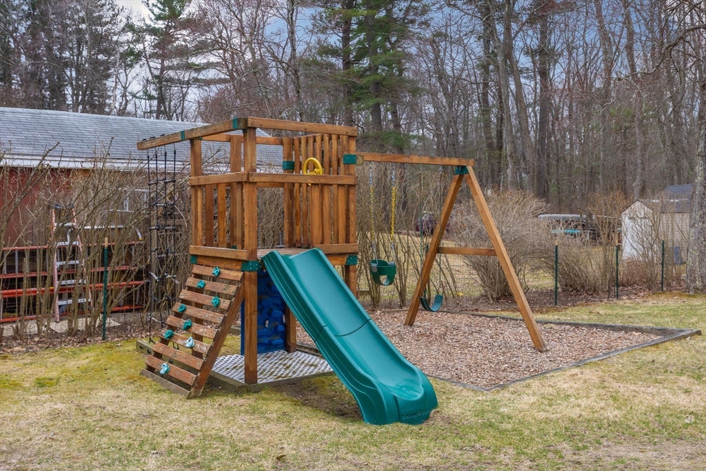 42 Swain Road Wilmington, MA 01887 - Photo 24 of 28 a view of a slide with a slide