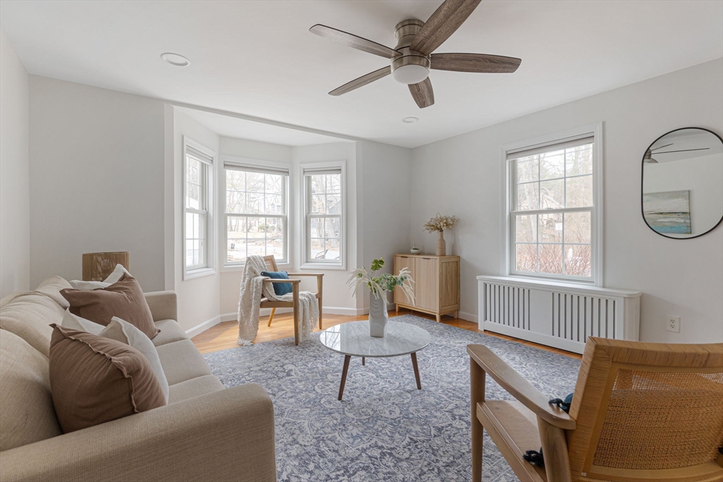 42 Swain Road Wilmington, MA 01887 - Photo 3 of 28 a living room with furniture and a window