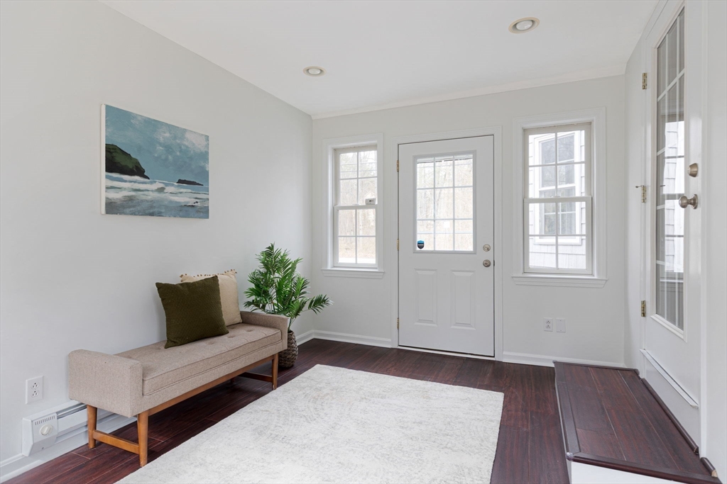 42 Swain Road Wilmington, MA 01887 - Photo 8 of 28 a living room with furniture and wooden floor