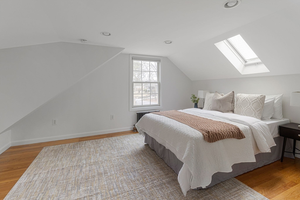 42 Swain Road Wilmington, MA 01887 - Photo 10 of 28 a bedroom with a bed and a window