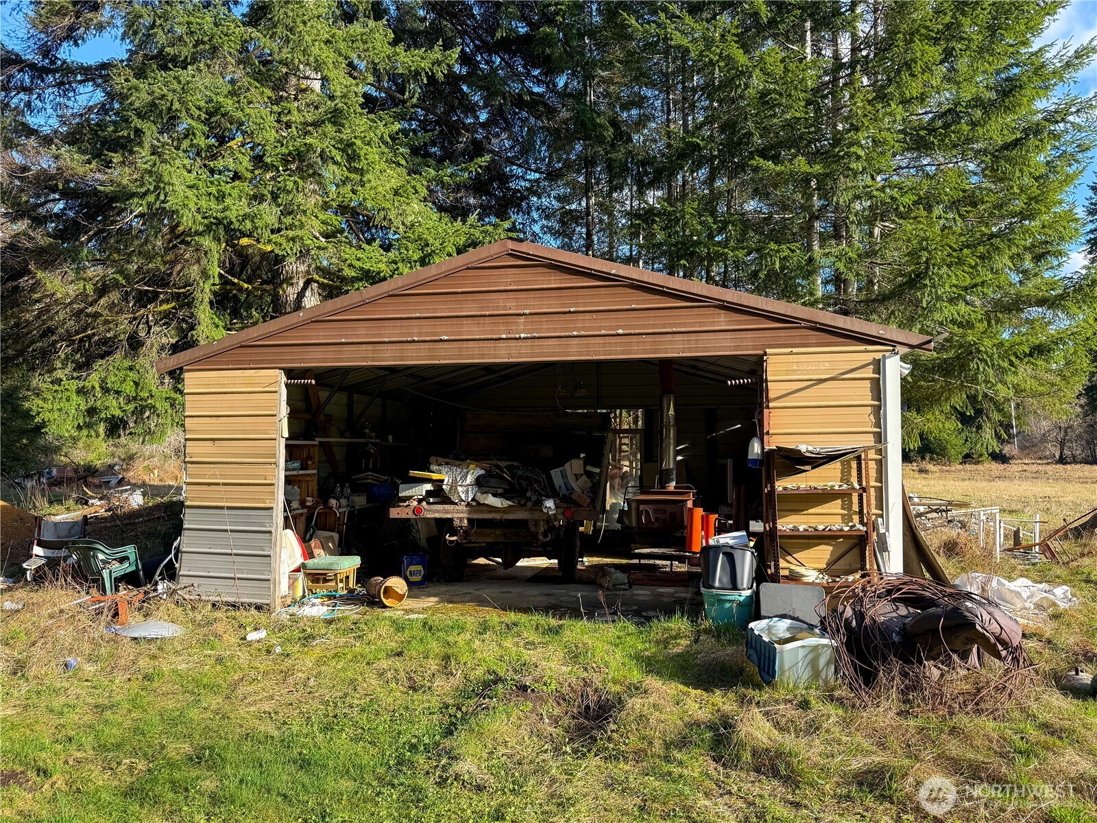 3190 East Hoquiam Road Hoquiam, WA 98550 - Photo 15 of 18 a view of a house with yard and sitting area